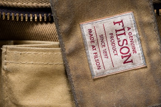 Pockets on a Filson Sportsman Bag likely made of unwaxed tin cloth.